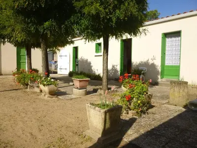 Jardin de l'établissement SJ000-005 - Maison 3 pièces 4 couchages - SAINT JEAN DE MONTS