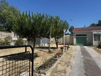 Jardin de l'établissement SJ000-005 - Maison 3 pièces 4 couchages - SAINT JEAN DE MONTS