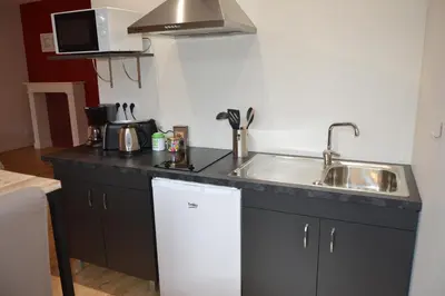 Cuisine ou kitchenette dans l'établissement Les Agîtés