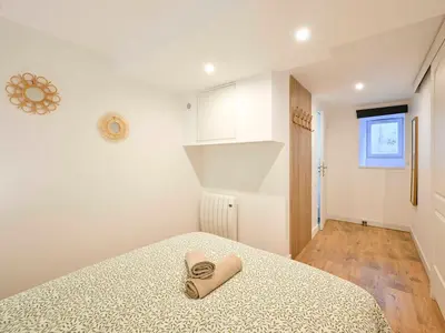 Un ou plusieurs lits dans un hébergement de l'établissement Atelier du Tisserand - Maison de caractère et calme
