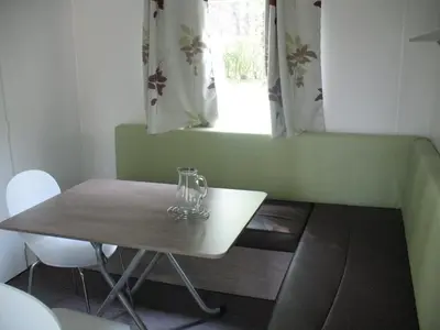 Coin salon dans l'établissement CAMPING Fleur de briere