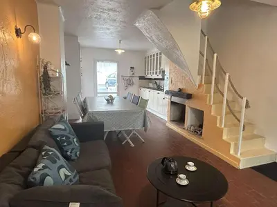 Coin salon dans l'établissement Maison - 8 couchages LA GUERINIERE