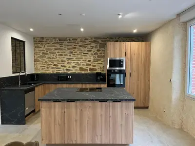 Cuisine ou kitchenette dans l'établissement Gite le moulin du Roho