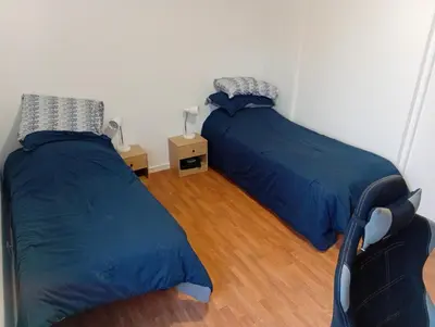 Un ou plusieurs lits dans un hébergement de l'établissement Appartement 3 pièces Saint Nazaire Ouest