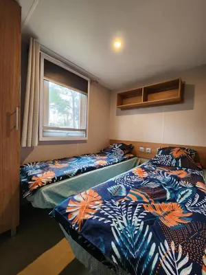 Un ou plusieurs lits dans un hébergement de l'établissement Sejour au Bois Dormant 88