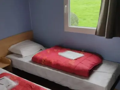 Un ou plusieurs lits dans un hébergement de l'établissement Mobil-home 4 Pers, Terrasse - Sainte Reine de Bretagne - API-1-52-1735