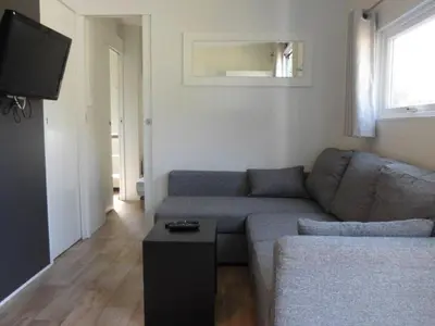 Coin salon dans l'établissement Mobil Home Confort avec Terrasse pour 6 pers. - API-1-52-1743