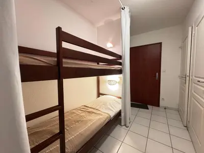 Un ou plusieurs lits dans un hébergement de l'établissement L'Embrun - TV, WiFi, Parking, Piscine de résidence