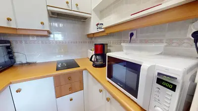 Cuisine ou kitchenette dans l'établissement Le Nautica