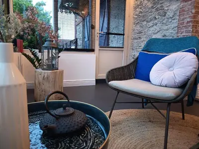 Coin salon dans l'établissement La Maison du Port de Couëron - Appartement Romance