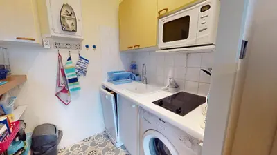 Cuisine ou kitchenette dans l'établissement Envol Marin