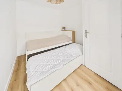 Un ou plusieurs lits dans un hébergement de l'établissement Maison à Pornic pour 4 - jacuzzi et terrasse