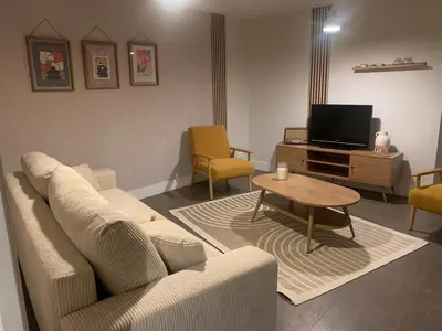 Télévision ou salle de divertissement dans l'établissement La Maréchale