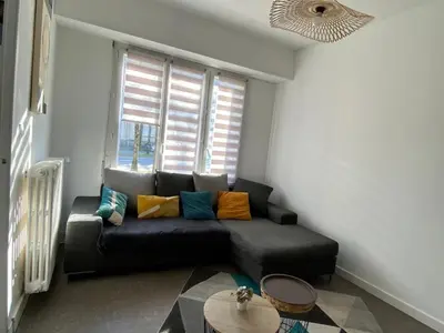 Coin salon dans l'établissement Appartement T4 - 3 chambres