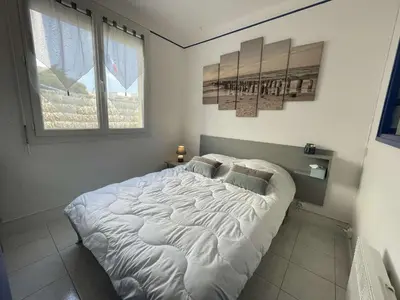 Un ou plusieurs lits dans un hébergement de l'établissement SJ000-JOS - Appart 2 pièces cabine 4 couchages SAINT JEAN DE MONTS