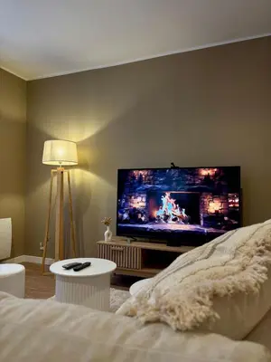 Télévision ou salle de divertissement dans l'établissement L'Auréa - Design Cosy Calme et Lumineux