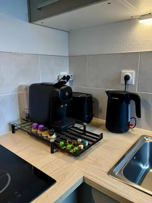 Cuisine ou kitchenette dans l'établissement L'Auréa - Design Cosy Calme et Lumineux