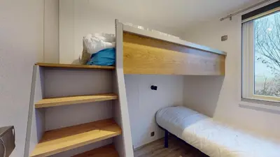 Un ou plusieurs lits dans un hébergement de l'établissement La Cabane de Besse