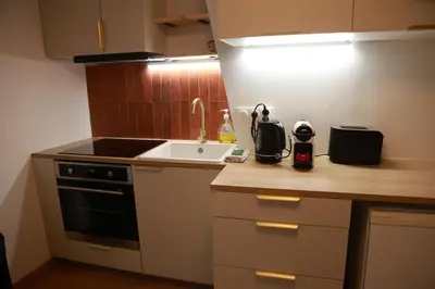 Cuisine ou kitchenette dans l'établissement Les Écuries - Studio Hyper Centre & Bouffay