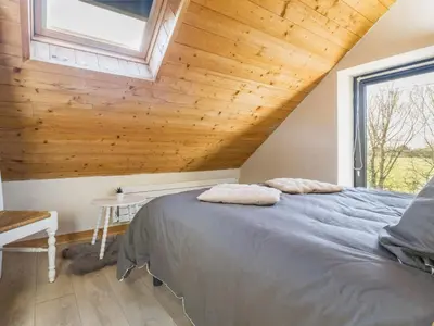 Un ou plusieurs lits dans un hébergement de l'établissement Gîte de Charme avec Cheminée et Spa en Campagne - FR-1-306-1333