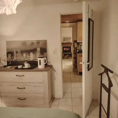 Cuisine ou kitchenette dans l'établissement CHAMBrE CHEZ L'HABITANT