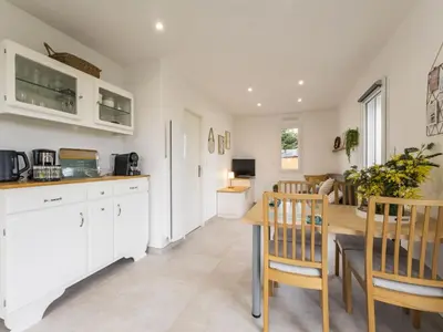 Cuisine ou kitchenette dans l'établissement Gîte au Calme avec Jardin et Parking Pratique - FR-1-306-1335
