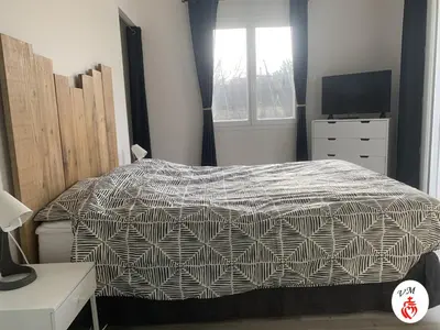 Un ou plusieurs lits dans un hébergement de l'établissement Maison contemporaine proche du PuyduFou