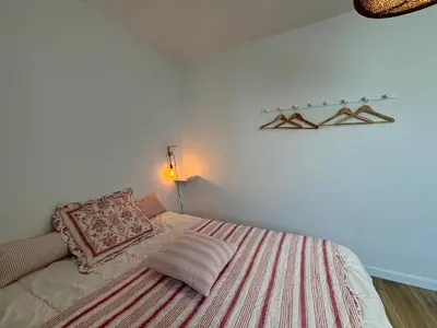 Un ou plusieurs lits dans un hébergement de l'établissement Éclatant Apt 5 pers avec Balcon et Garage - FR-1-323-599
