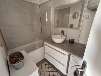 Salle de bains dans l'établissement RIEZ Entre Mer et Dunes