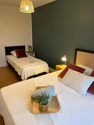 Un ou plusieurs lits dans un hébergement de l'établissement Nid des Hirondelles Gîte cozy terrasse & parking proche du Puy duFou