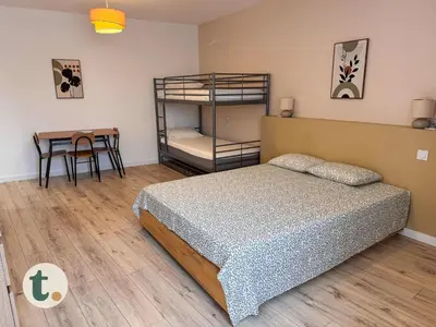 Un ou plusieurs lits dans un hébergement de l'établissement Tranquiloue - Gite 15 personnes - 10min Puy du Fou