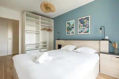 Un ou plusieurs lits dans un hébergement de l'établissement Appartement lumineux et calme au pied des Machines