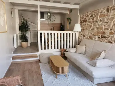 Coin salon dans l'établissement Les Cotonniers, duplex cosy