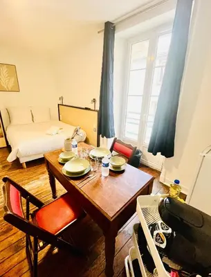 Coin salon dans l'établissement Apparthotel Beauregard 11 cœur de Nantes WIFI