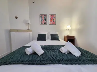 Un ou plusieurs lits dans un hébergement de l'établissement La Maison de l'Île, calme & atypique, proche Loire