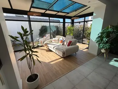 Coin salon dans l'établissement Maison 2 chambres