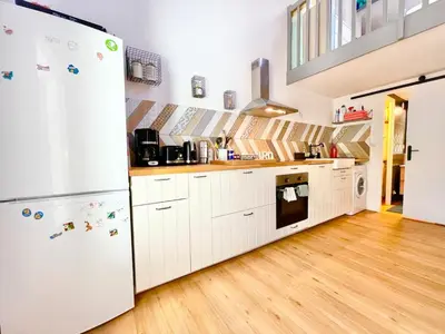 Cuisine ou kitchenette dans l'établissement Maison plage à pied avec piscine - Terrasse privée