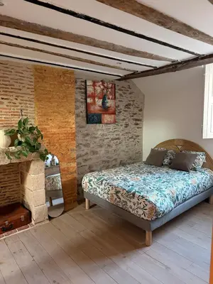 Un ou plusieurs lits dans un hébergement de l'établissement Cocon en pierre au coeur des rues de Nantes