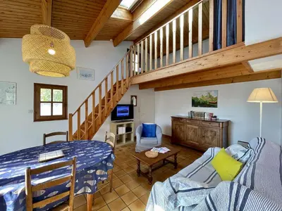 Coin salon dans l'établissement NO000-2CG Mais 2 pièces mezzanine - 4 couchages NOIRMOUTIER EN L'ILE