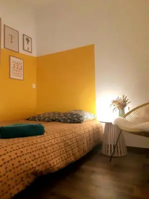Un ou plusieurs lits dans un hébergement de l'établissement Bienvenue dans ce charmant studio