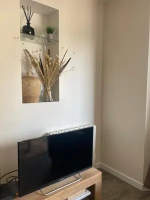 Télévision ou salle de divertissement dans l'établissement AU CHOLETAIS T2-50m2 - Déco originale - 20mn Puydufou