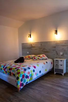 Un ou plusieurs lits dans un hébergement de l'établissement La Grange aux Grenouilles