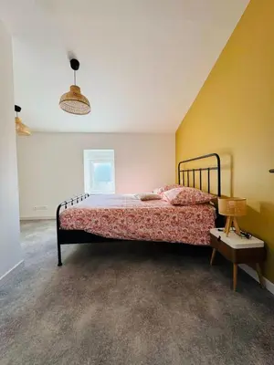 Un ou plusieurs lits dans un hébergement de l'établissement Villa Bella