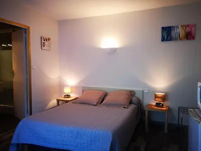 Un ou plusieurs lits dans un hébergement de l'établissement Guest House La Fauvelaie
