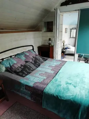 Un ou plusieurs lits dans un hébergement de l'établissement Gîte des pêcheurs
