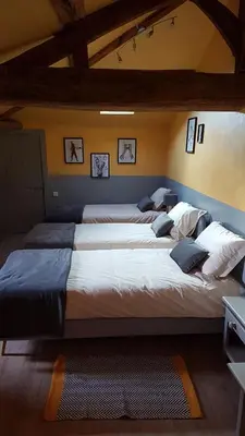 Un ou plusieurs lits dans un hébergement de l'établissement Le Vieux Logis de la Galocherie