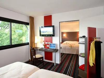 Un ou plusieurs lits dans un hébergement de l'établissement ibis Styles Segre