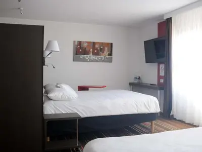 Un ou plusieurs lits dans un hébergement de l'établissement ibis Styles Segre