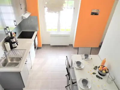 Cuisine ou kitchenette dans l'établissement Le Gîte du Petit Plessis