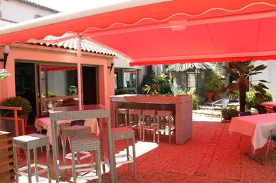 Restaurant ou autre lieu de restauration dans l'établissement Logis Hotel Restaurant Le Grand Turc